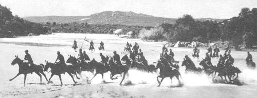 Buffalo Soldiers - The 28th Cavalry crosses an arroyo at Camp Lockett in Campo, California, just east of San Diego. The 28th trained and then served as boarder patrol from Camp Lockett before being shipped to North Africa in 1944.