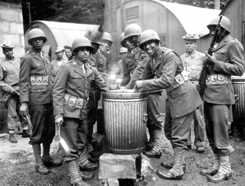 Buffalo Soldiers - A Chronology of African American Military Service From World War I through World War II  - Negro soldiers draw rations at the camp cook house at their station in Northern Ireland. Detachments of Negro troops were among the latest arrivals with the American forces in Northern Ireland. 