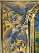 Dragon and eagle marginalia illumination Ghent 