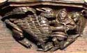 A knight kills a griffon on a carved misericord in the parish church of Boston Lincolnshire Medieval