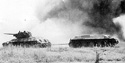 The evacuation vehicle being is towing the damaged T- under the enemy fire Kursk July 