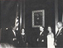 President Kennedy and Jackie receive the painting