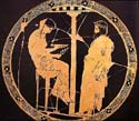 Pythia sitting on the Delphic Tripod Cauldron and a priest Red Figure Kylix