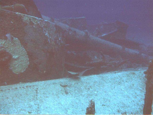 View of gun and side of barbette on the wreck of Infanta Maria Teresa.