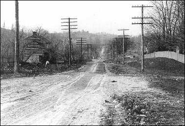 Dirt, and muddy, roads were still common in the 1930s.