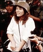 Vietnam War - What part did Jane Fonda Play? Color photo of Jane Fonda sitting in the gun seat