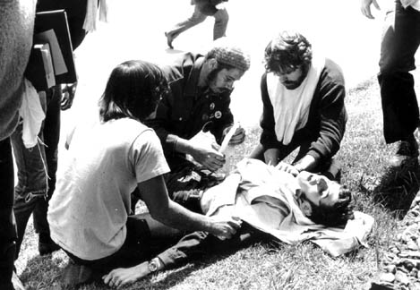 Vietnam War - KentState, An injured student being given first aid.