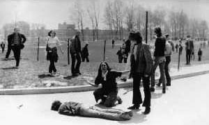 Vietnam War - This Pulitzer Prize winning photo by John Filo shows Mary Ann Vecchio screaming as she kneels over the body of student Jeffrey Miller at Kent State University on May 4, 1970. National Guardsmen had fired in to a crowd of demonstrators, killing four and wounding nine.