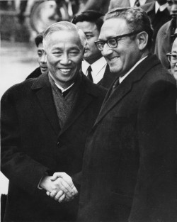 Vietnam War - Betraying allies and POWs: U.S. presidential advisor Henry Kissinger and Hanoi's Le Duc Tho smile broadly at the Paris "peace summit" in January 1973. Their agreement, which Kissinger claimed would bring "peace with honor," consigned millions of Vietnamese, Laotians, and Cambodians to slaughter and brutal oppression, and left hundreds of American POWs to rot in Communist prisons.